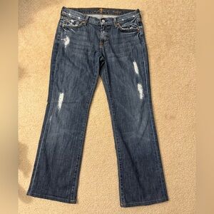 7 for all Mankind bootcut jeans. Distressed. Size 29.